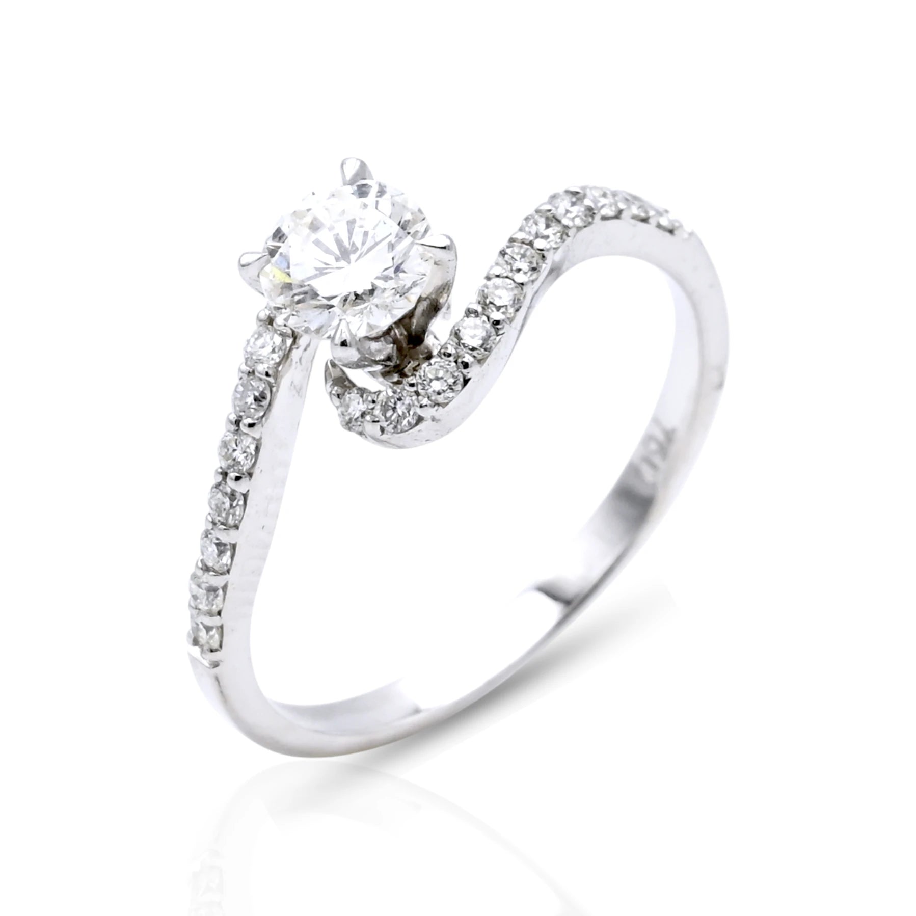 White gold ring with a diamond on a white background
