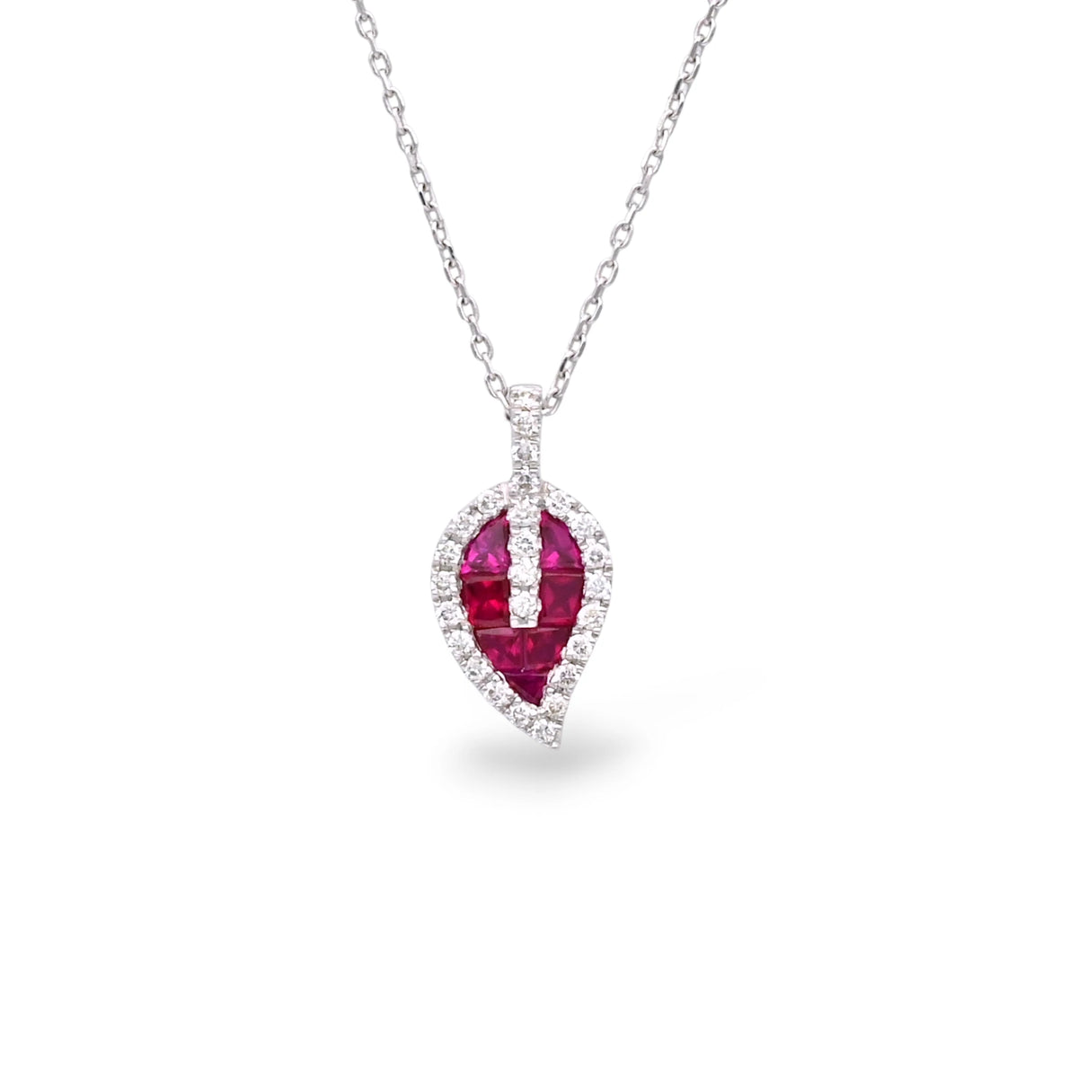 Leaf design ruby pendant with diamond halo and white gold chain
